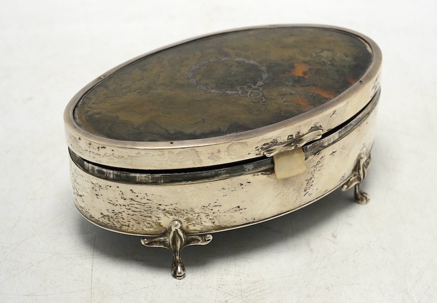 A George V silver and tortoiseshell mounted oval manicure box, E.S. Barnsley & Co Ltd, Birmingham, 1912, 13.5cm, incomplete. Condition - poor
